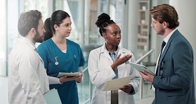 Compliance_640 Group of doctors meeting